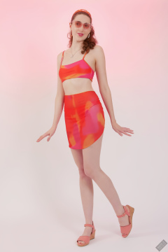 2025-06-14 Estella Rose models her own brightly coloured bikini ensemble