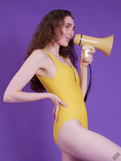 2025-06-14 Mellow Yellow set. Estella Rose models yellow one-piece sports swimsuit and a box load of other yellow sporty stuff