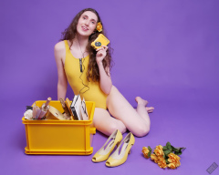 2025-06-14 Mellow Yellow set. Estella Rose models yellow one-piece sports swimsuit and a box load of other yellow sporty stuff