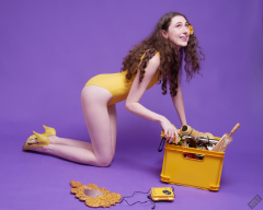 2025-06-14 Mellow Yellow set. Estella Rose models yellow one-piece sports swimsuit and a box load of other yellow sporty stuff