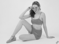 2025-06-14 Estella Rose models her own brightly coloured bikini ensemble