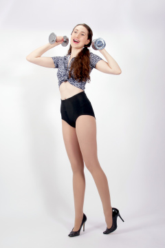 Estalla Rose exercises in vitage t-shirt and girdle Estalla Rose exercises in vitage t-shirt and girdle