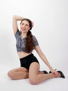 Estalla Rose exercises in vitage t-shirt and girdle Estalla Rose exercises in vitage t-shirt and girdle