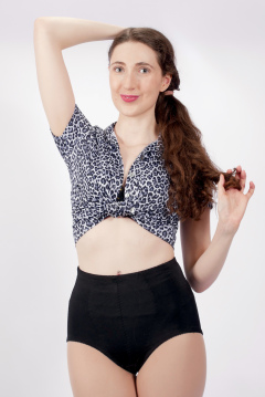 Estalla Rose exercises in vitage t-shirt and girdle Estalla Rose exercises in vitage t-shirt and girdle