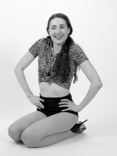 Estalla Rose exercises in vitage t-shirt and girdleWide-angle shot of the studio