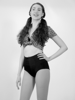 Estalla Rose exercises in vitage t-shirt and girdle Estalla Rose exercises in vitage t-shirt and girdle