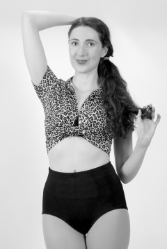 Estalla Rose exercises in vitage t-shirt and girdle Estalla Rose exercises in vitage t-shirt and girdle