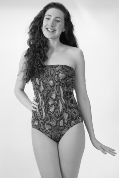 Estalla Rose in 1990's snakeskin one-piece swimsuit