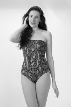 Estalla Rose in 1990's snakeskin one-piece swimsuit