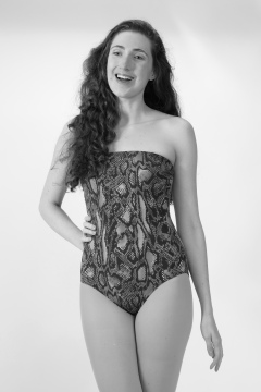 Estalla Rose in 1990's snakeskin one-piece swimsuit