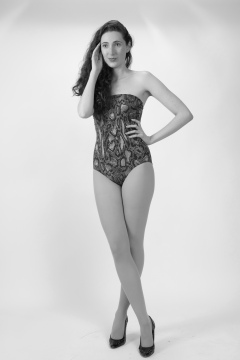 Estalla Rose in 1990's snakeskin one-piece swimsuit
