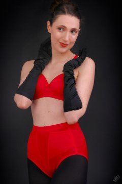 2026-02-07 Estella-Rose matching red bra and control briefs worn as hot pants