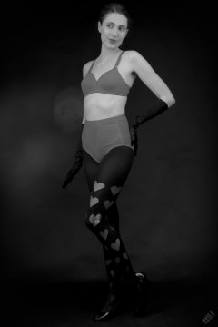 2026-02-07 Estella-Rose matching red bra and control briefs worn as hot pants