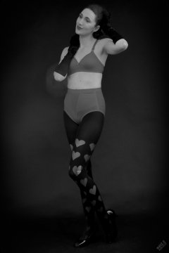 2026-02-07 Estella-Rose matching red bra and control briefs worn as hot pants