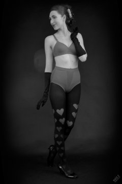 2026-02-07 Estella-Rose matching red bra and control briefs worn as hot pants