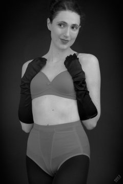 2026-02-07 Estella-Rose matching red bra and control briefs worn as hot pants