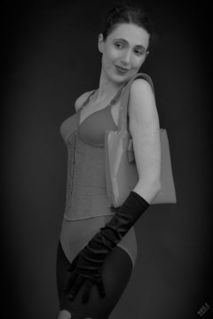 2026-02-07 Estella-Rose matching red bra, under bust corset and control briefs worn as hot pants