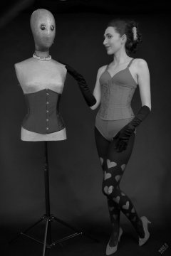 2026-02-07 Estella-Rose matching red bra, under bust corset and control briefs worn as hot pants