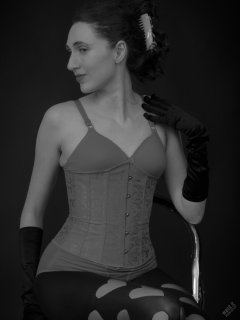 2026-02-07 Estella-Rose matching red bra, under bust corset and control briefs worn as hot pants