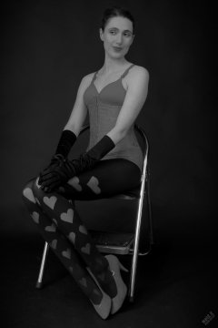 2026-02-07 Estella-Rose matching red bra, under bust corset and control briefs worn as hot pants