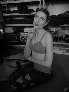 2026-02-07 Estella-Rose matching red bra and control briefs worn as hot pants, relaxing after shoot