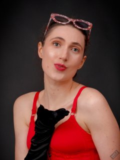 2026-02-07 Estella-Rose matching red bra, under bust corset and control briefs worn as hot pants