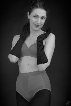 2026-02-07 Estella-Rose matching red bra and control briefs worn as hot pants