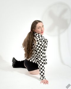 2026-08-01 Estella Rose models black one-piece swimsuit and accessories..