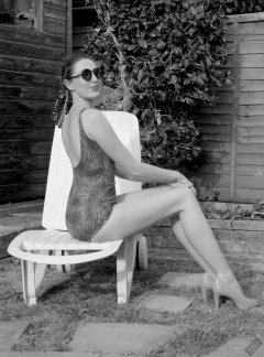 2026-08-01 Estella Rose models copper coloured Half Moon swimsuit.