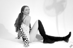 2026-08-01 Estella Rose models black one-piece swimsuit and accessories..