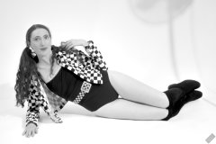 2026-08-01 Estella Rose models black one-piece swimsuit and accessories..