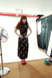 Kirsten-Ria in long black and gold cheongsam