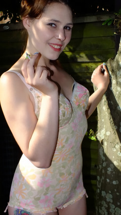 Lora in Berlei corselette, enjoying a brief break in the garden