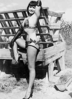 Bettie Page posing in swimsuit
