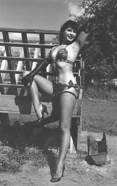 Bettie Page posing in swimsuit