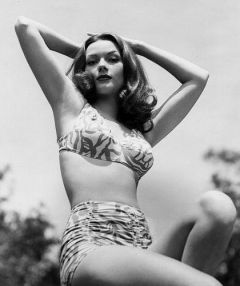 influences: Hazel Brooks in tight two-piece swimsuit