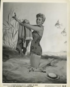 influences: Kim Novak in tight one-piece swimsuit