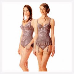 influences: models in matching brown corselet and basque