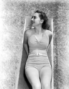influences: Olivia De Havilland in two-piece swimsuit