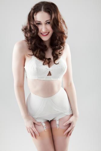 Unknown model in white bra and girdle